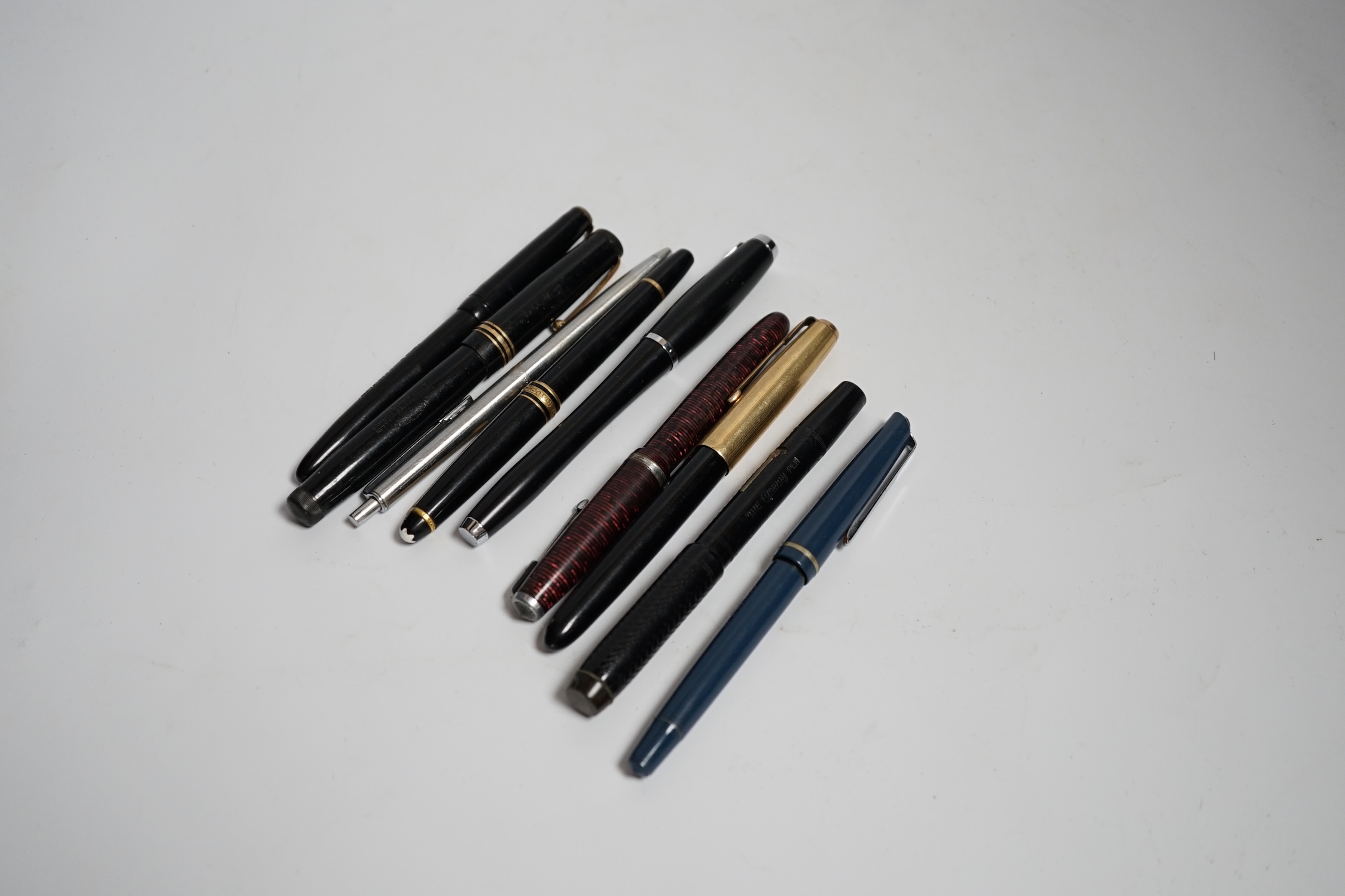 A Montblanc Meisterstuck fountain pen and a quantity of mostly Parker pens